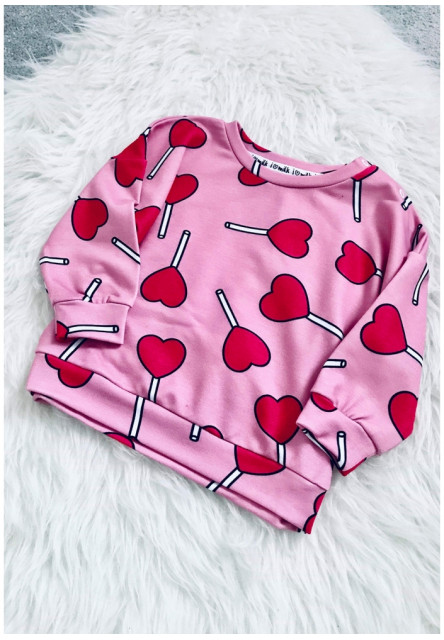 Rózaszín pulóver nyalóka mintával 